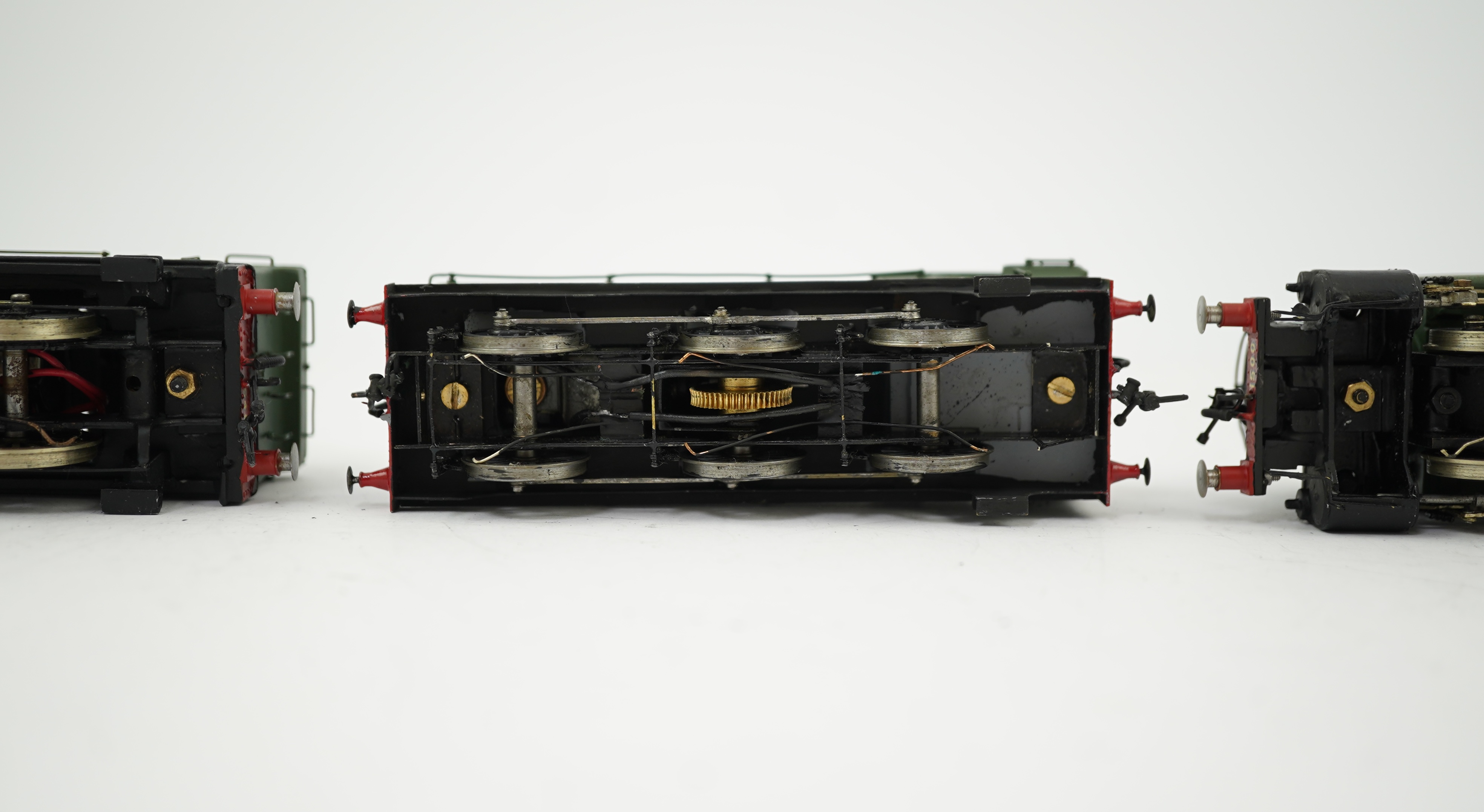 Three 00 gauge brass and white metal kit built GWR tank locomotives; a 15xx class 0-6-0T, 1500, together with an 54xx class 0-6-0PT, 5406, and a 19xx class 0-6-0PT, 1925, all constructed, painted and lined to a high stan